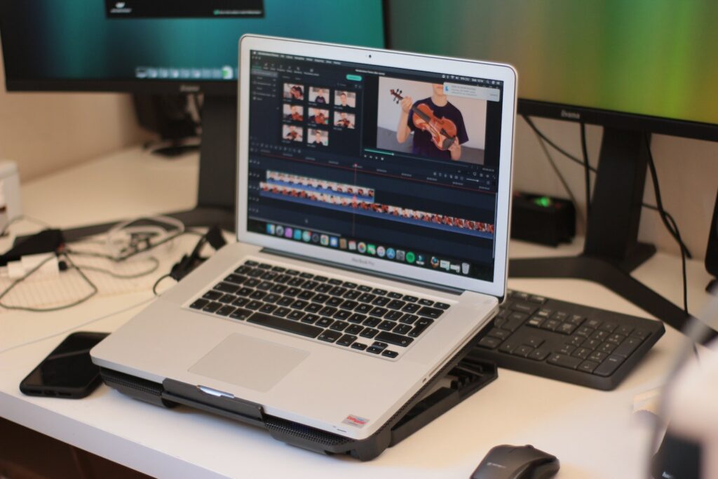 Macbook Pro on brown wooden table